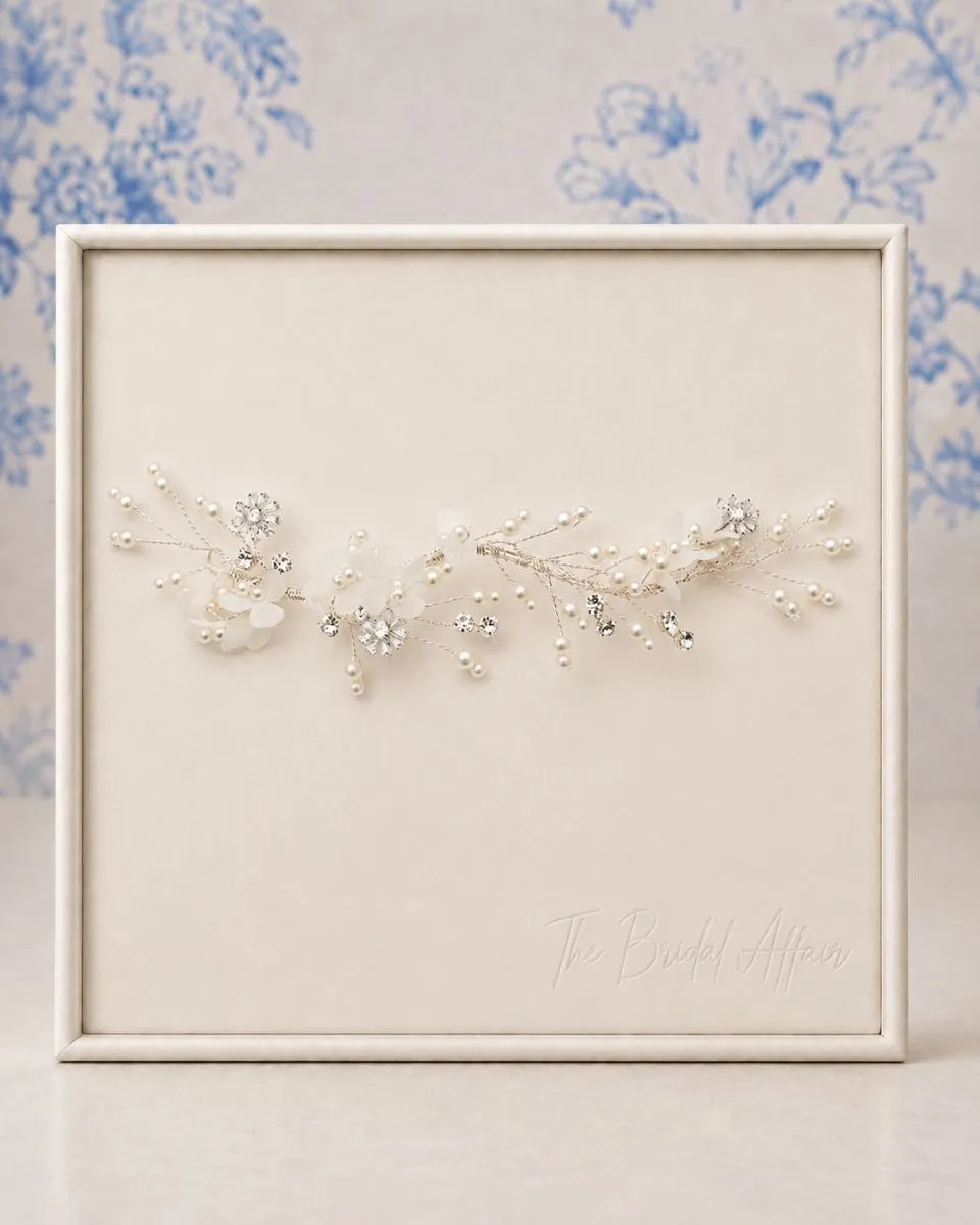 Richard Designs TR2270A floral crystal bridal hair vine on ivory satin display.