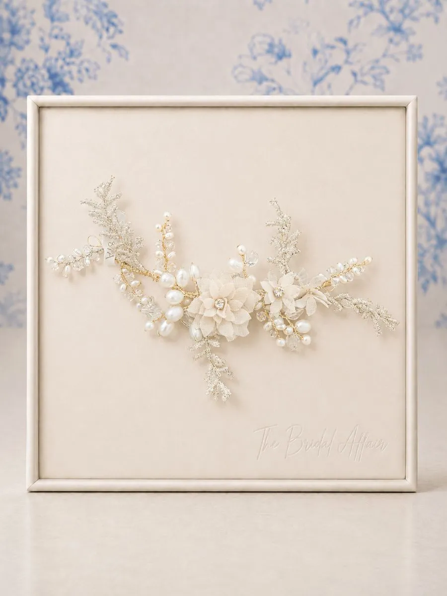 Richard Designs TR2381A pearl and floral bridal hair vine on ivory satin display.
