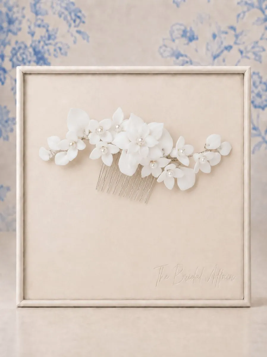 Athena 9799 Allure Hair Comb displayed on ivory satin frame.