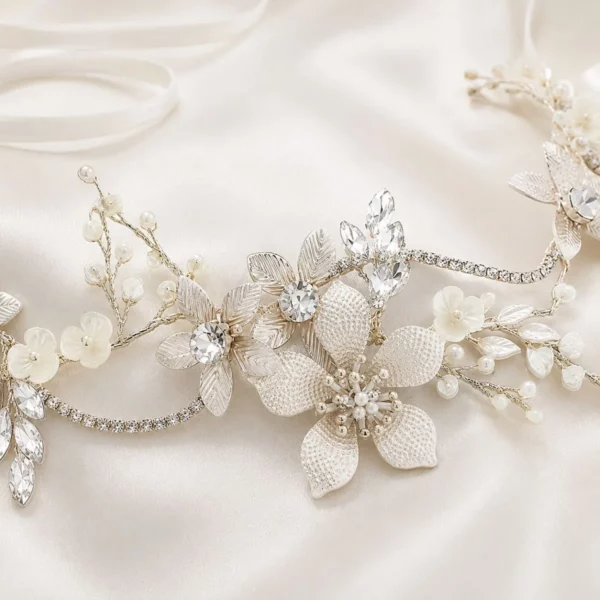 Close-up of Athena 1812 silver bridal hair vine with Marquise crystals and pearls.