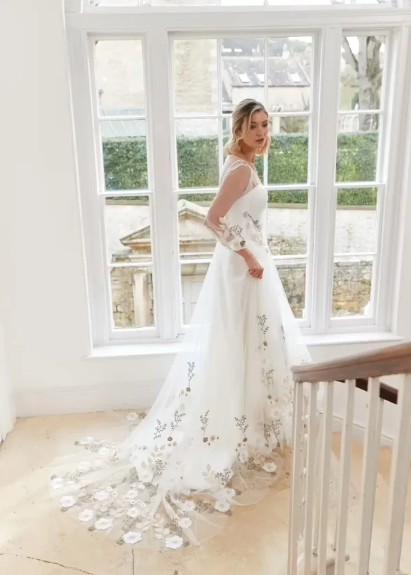 Romantica of Devon Blossom wedding bride on starirs