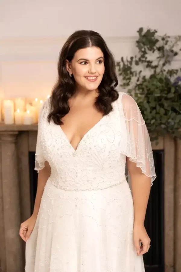 True Curves Mila TC-W476 wedding dress front detail with sleeves