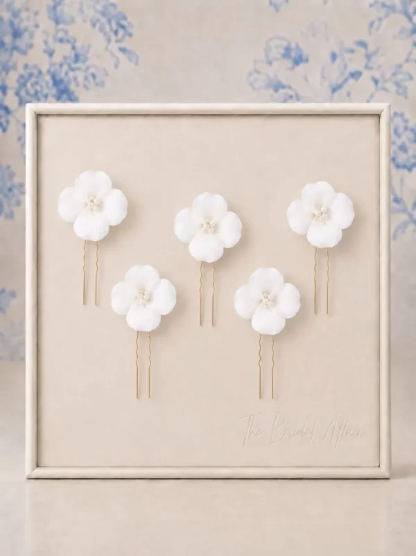 The Perfect Bridal Company PBH7062 Floral Pin Set displayed on ivory satin frame.