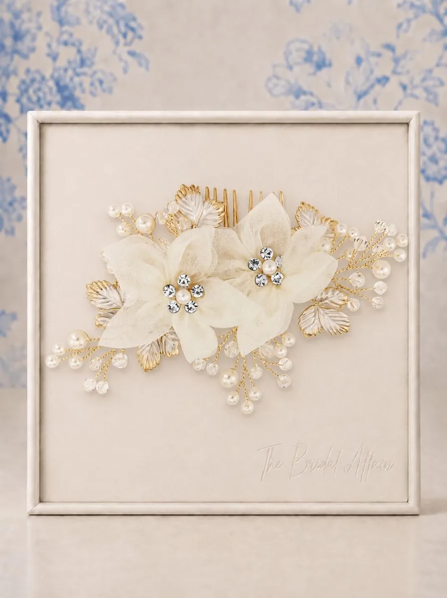 Athena 1603 Gold Divine Haircomb displayed on ivory satin frame.