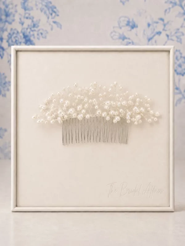 Richard Designs CP394 Fresh Water Pearl Spray Comb on ivory satin display.