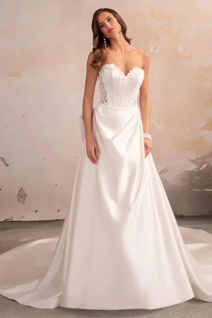 Satin wedding dress with clean lines and smooth structured skirt