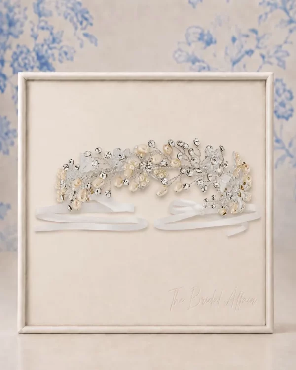 Athena 1426 Romantic Vine Headpiece displayed on ivory satin frame.