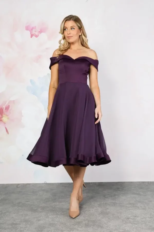 Modern tea-length wedding dress by Emma Bridals with full satin skirt