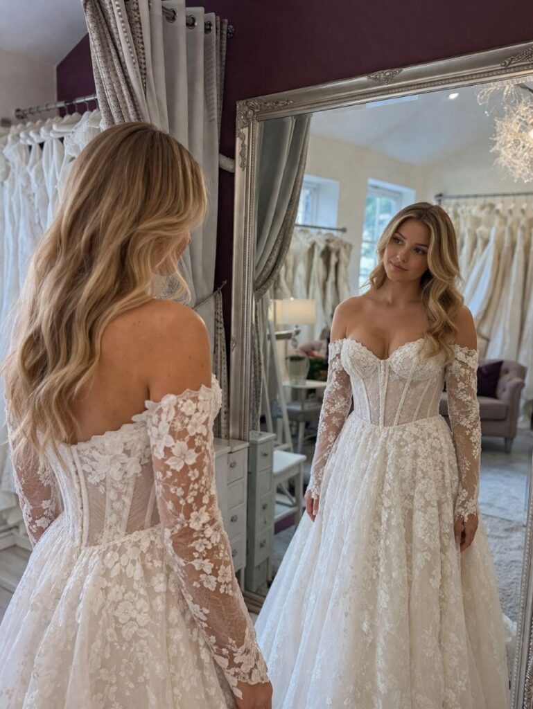 Bride trying on a wedding dress during a private appointment at The Bridal Affair