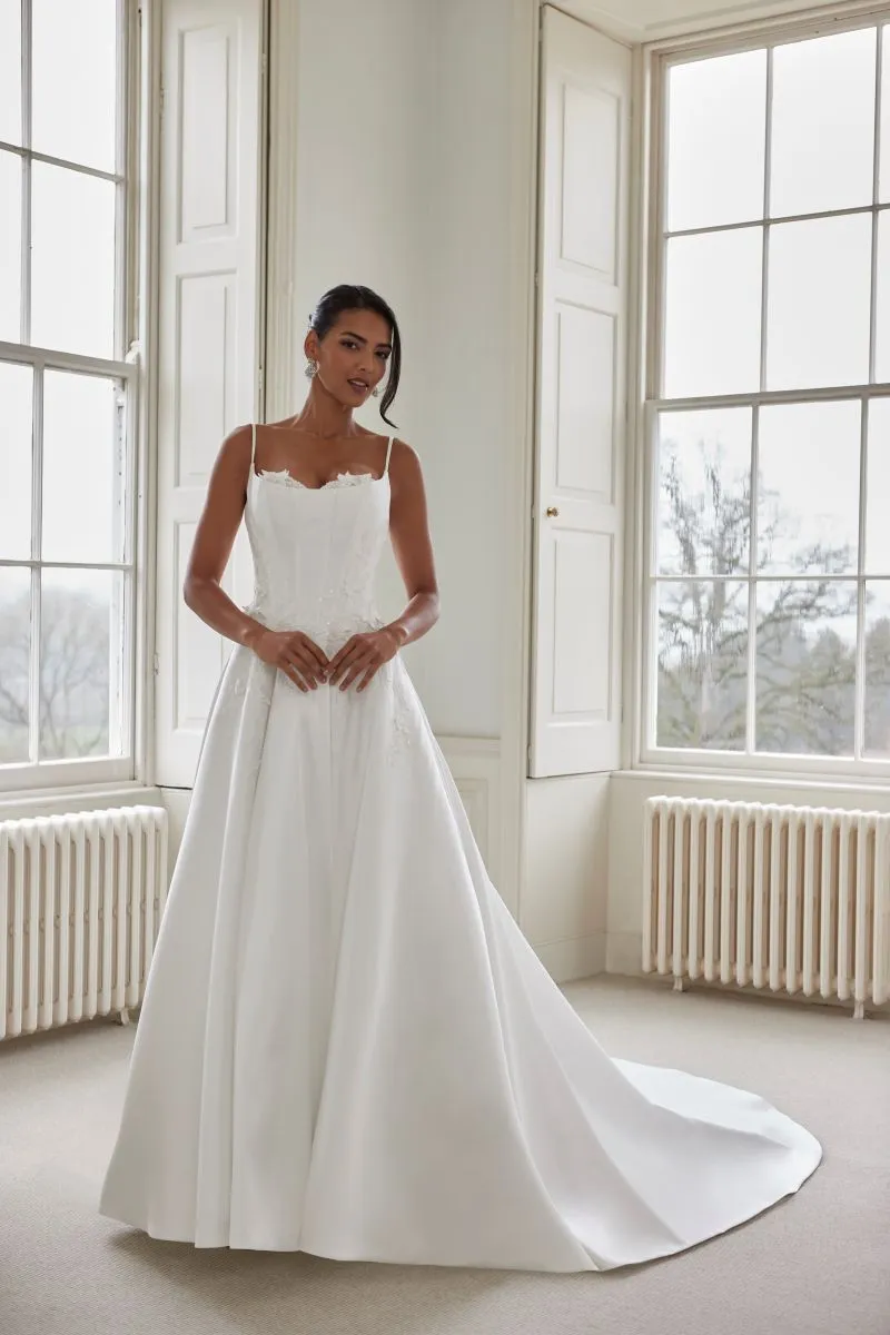 Front view of Precious wedding dress with elegant satin A-line silhouette and feminine lace detailing