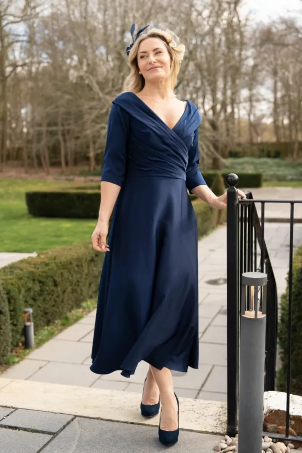Richard Designs Jennifer RDAD1349 navy mother of the bride occasion dress with off-the-shoulder neckline and flowing skirt