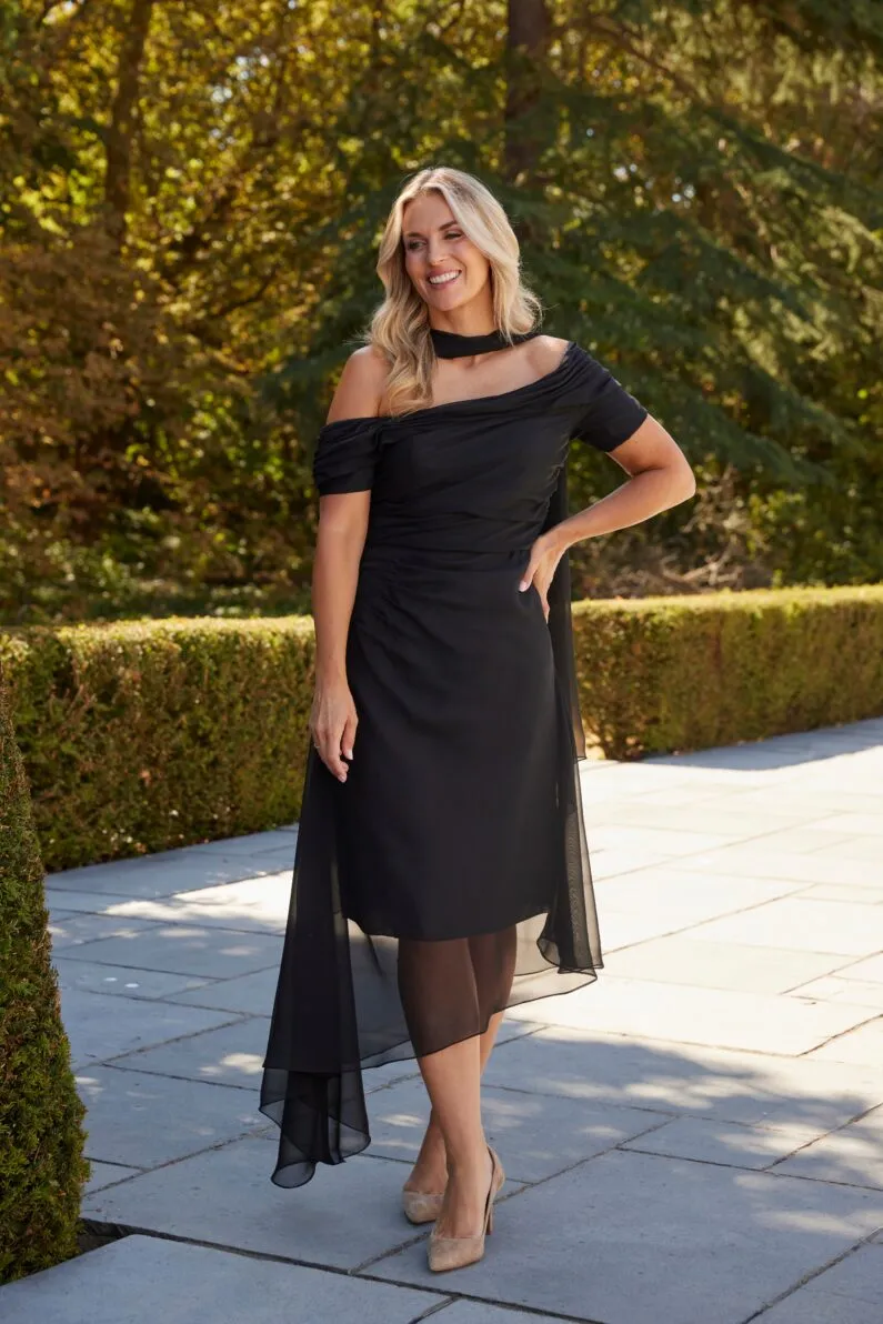 Richard Designs Bernadette black chiffon occasion dress with asymmetric neckline, flowing hem and matching scarf