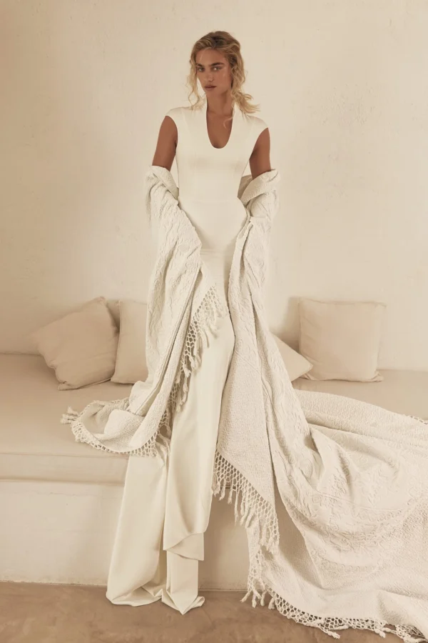 Eva Lendel Appolo fitted ivory wedding dress with modern scoop neckline and elegant cap sleeves