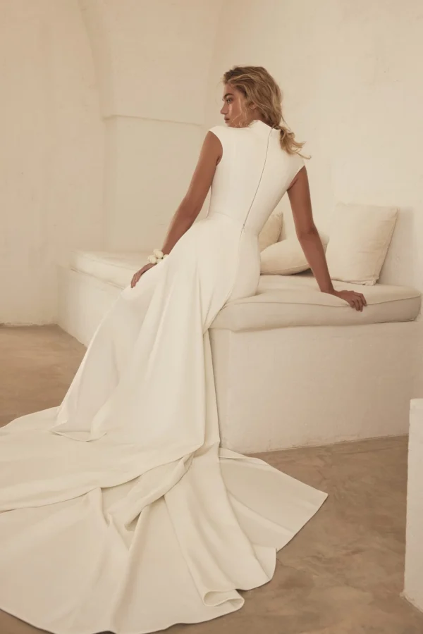 Eva Lendel Appolo minimalist fitted wedding gown with cap sleeves and sleek ivory column silhouette